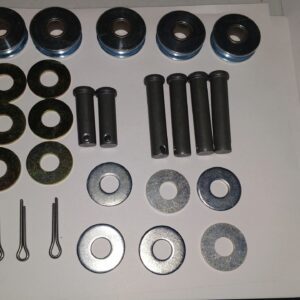 Various metal washers, bolts, and cotter pins arranged on a surface.