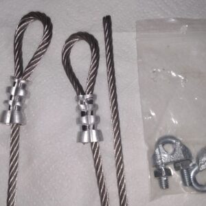 Steel wire ropes with clamps and a U-bolt clamp on a plastic sheet.